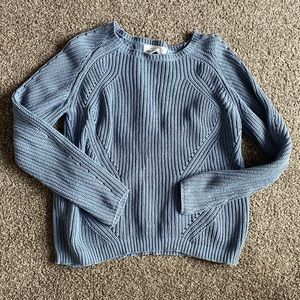 light blue sweater